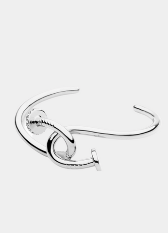 Ava Twisted Elegance Bangle in silver plating—sleek, modern, and versatile. Perfect for elevating everyday looks in Hong Kong.