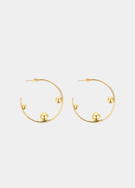 The Terra Hoops are a modern twist on a timeless classic. Crafted in 18K gold-plated 925 sterling silver, these hoops balance elegance and boldness for any occasion.