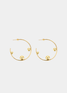 The Terra Hoops are a modern twist on a timeless classic. Crafted in 18K gold-plated 925 sterling silver, these hoops balance elegance and boldness for any occasion.