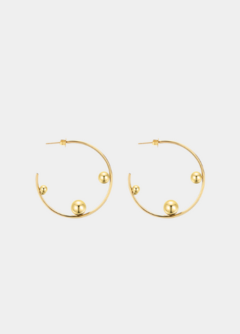 The Terra Hoops are a modern twist on a timeless classic. Crafted in 18K gold-plated 925 sterling silver, these hoops balance elegance and boldness for any occasion.