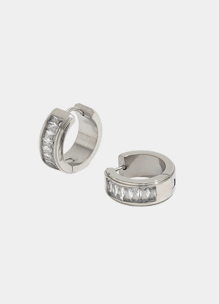 Silver-plated huggie earrings with a pavé band of sparkling zirconia, designed for a chic and timeless look.