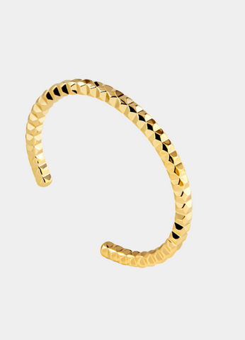 Enzo Bangle in 18K gold plating—sleek, minimalist, and versatile. Perfect for stacking or solo wear, a timeless accessory for Hong Kong style.