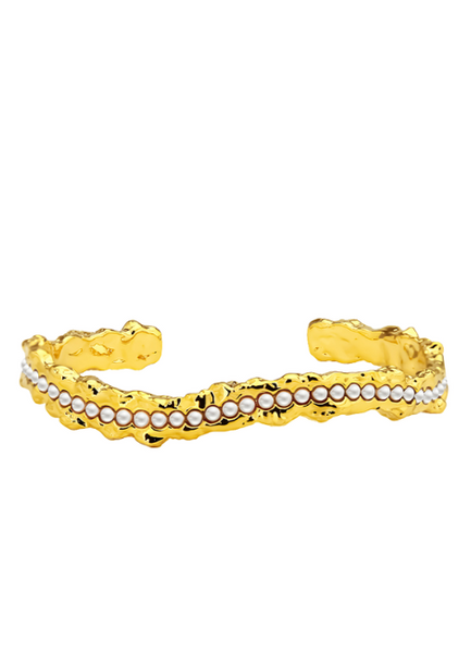 The Minou Bangle features a lustrous pearl on an elegant 18K gold plated band—timeless sophistication perfect for women in Hong Kong.