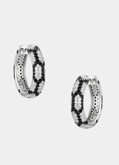 White and black zebra pattern hoop earrings adorned with sparkling cubic zirconia for a fierce and fashionable look.