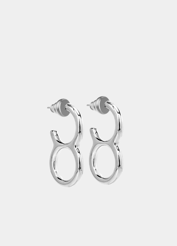 Chic Paloma earrings with a sleek silver plated finish, perfect for adding a touch of elegance to everyday or formal outfits.