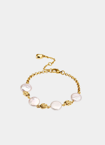 Pearls & Flowers Bracelet—delicate florals meet lustrous pearls in 18K gold plating.